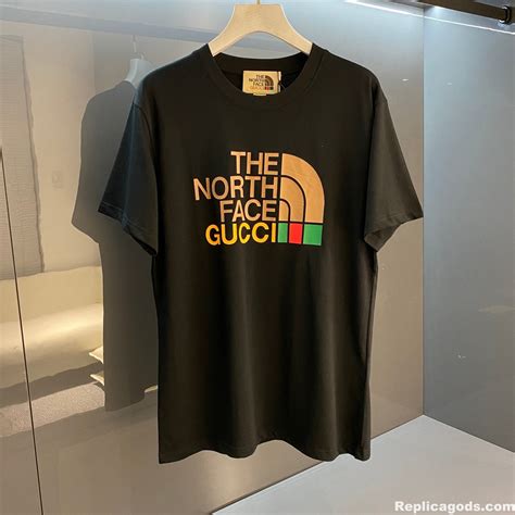 tee shirt north face gucci